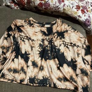 It’s a crop top t-shirt. It’s from SHEIN. Size medium. It’s made in China.